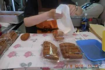 <p>They pack korokkes in a plastic case and wrap with a paper very carefully.</p>