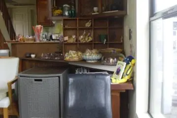 <p>It looks like someone's house, but with nicely wrapped Western-style treats on the counter</p>