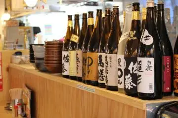 <p>Sake bottles, but beer, Hoppi, and Kaku highballs are also available.</p>