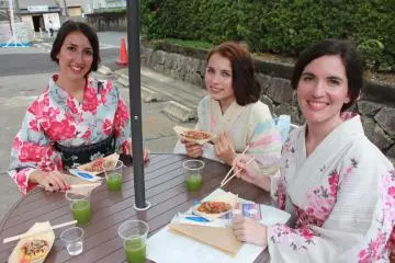 <p>Enjoying the ennichi outside the Visitor Center</p>