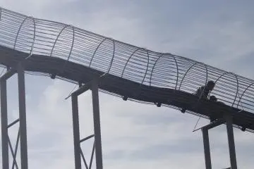 <p>A man and his son going down the slide.&nbsp;</p>