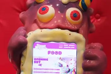A monster friend holds up the menu for me!