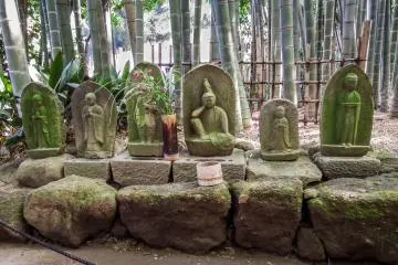 <p>The first of several dozen 'Jizo' statues located within the bamboo garden</p>