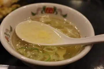 Egg drop soup comes with the rice&nbsp; (Photo: Edward Yagisawa Cannell)