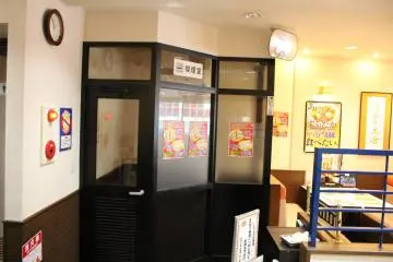 <p>An enclosed smoking area in an otherwise smoke-free restaurant</p>