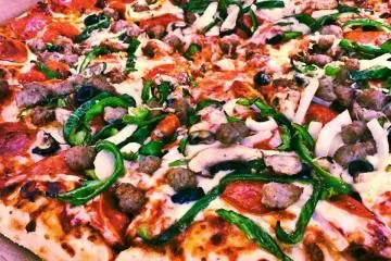 Stop by one of the many eateries in the city that serve food ranging from local delicacies to global staples like pizza.
