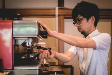 Barista working that coffee magic