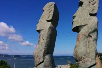 The background is a peaceful sea. It is hard to believe it could cause such destruction