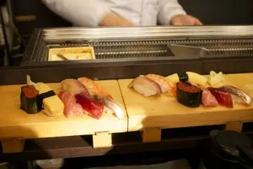 <p>A few pieces of sushi on display</p>