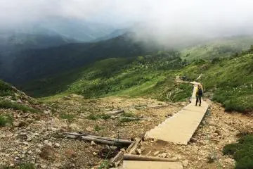 <p>A wooden stair case down the mountain helps climbers descend.&nbsp;</p>