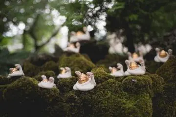 <p>Figurines near the purified water basin</p>