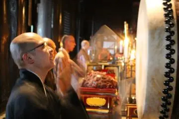 <p>The monks chanting and drumming during the morning prayer</p>