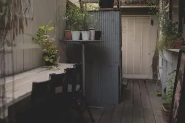 <p>Outside seating with a little window to order at</p>