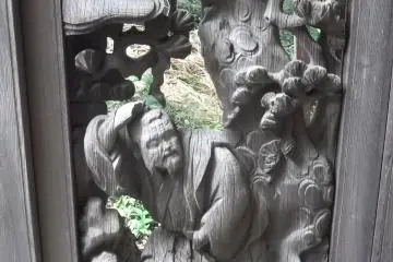 <p>An elaborate carving by one of the halls</p>