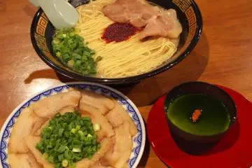 <p>Ichiran's tonkotsu ramen, yaki-buta sara (grilled pork dish) and matcha annin tofu.</p>