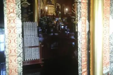 <p>The central part of the main temple is ornately decorated with gold leaf and material with gold thread. An expensive incense from ancient trees gives off a wonderful aroma.</p>