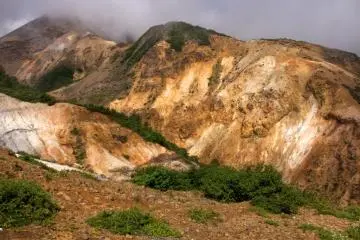 Yellow-tinted landscape near Okama crater lake