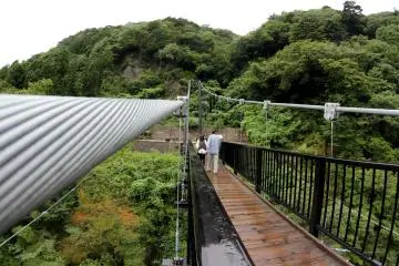 The suspended bridge is incredibly sturdy and has steel wires attached on both sides. However, it does sway a little bit when people walk on it.&nbsp;