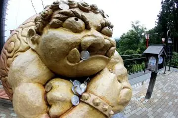 This guy is waiting for you on the other side of the bridge and many people make wishes and put coins on him as well as ring a nearby bell afterwards.&nbsp;
