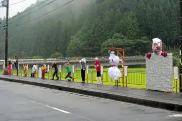 <p>"Kakshi" scarecrows made by the villagers near the Doyabara aid station</p>