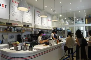 <p>Beyond this counter area is an indoor seating spot as well as a terrace</p>