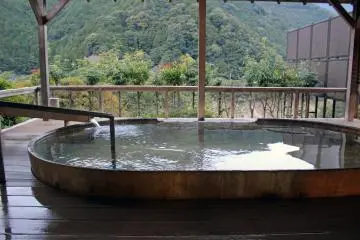 <p>The wood construction outdoor bath. A rock construction outdoor back also exists. Men and women alternate between the baths every 12 hours</p>