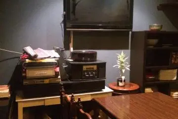 The TV and decorations in the back room. (Photo: Sarah Elisabeth Chaney)