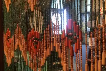 The curtain separating the back dart room. (Photo: Sarah Elisabeth Chaney)