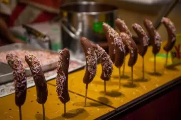 <p>Frozen choco-bananas on a stick</p>