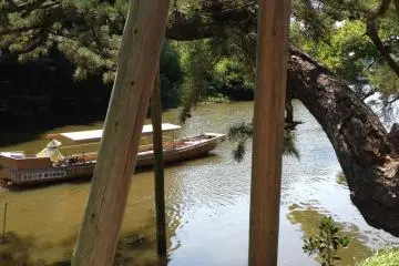 A view of the boat meandering along side the road to the north of the castle.