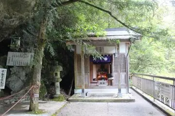 <p>The shrine and altar to the Eleven Faced King Fudomyo-sama, Buddhist deity of discipline</p>