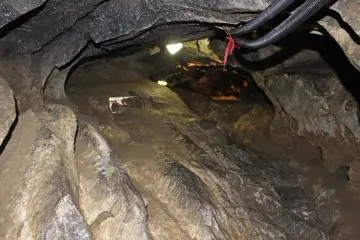 <p>With two bundles of power lines hanging down from an already low ceiling and a wall canted over quite a ways from vertical this was a</p>
