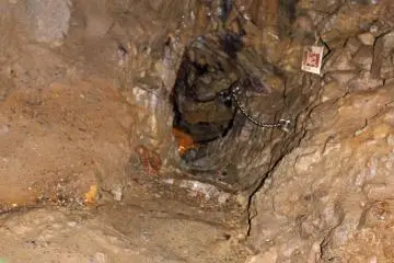 <p>The narrow passage in and out of the deepest point of the cave</p>