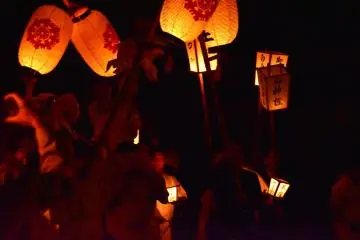 <p>Lantern lights glowing in the dark</p>