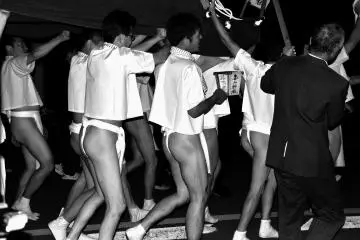 <p>Lion bearers' march in B&amp;W</p>