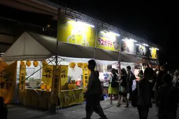 <p>Festival food and beer stalls were present outside the Kasugano International Forum Hall</p>