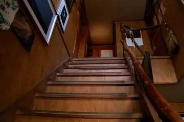 <p>Stairs to some of the rooms</p>