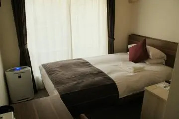 One of the cozy single rooms