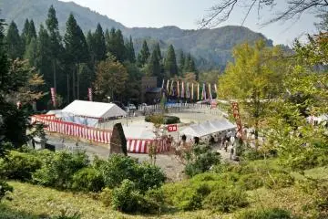 <p>The main festival area surrounded by mountains</p>