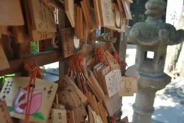 <p>People wrote their prayers on these plaques and hung them up in the shrine</p>
