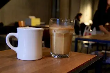 <p>An iced caffe latte and a hot lemonade</p>