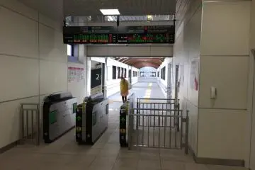 The new "Midori Exit," once a dull path out of the station. Now a bright and clean improvement.