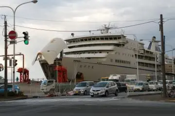 Ferry are taking up car before departure from Sado Island bound for Niigata
