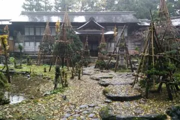 Stone paths lead through the ponds