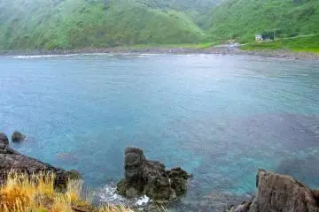 Kamaya Beach and campground and the blue water of the cove