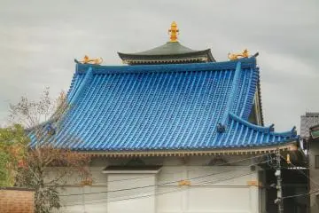 Even if the sky is not blue, the roof makes up for it