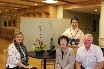 <p>The ikebana instructors take part in the moment</p>