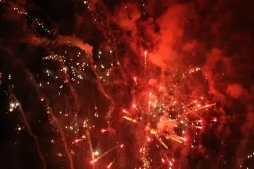 Fireworks color the night sky