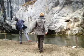<p>There is a small opening across the river believed that if you can throw a stone inside the hole, you'll get a good luck. You can purchase the lucky stones from the boatmen, 100 yen for 5 stones.</p>