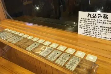 <p>You can press these buttons to light up the respective barrels to see the colour of the unrefined soy beans as they are undergoing fermentation for up to a year.</p>